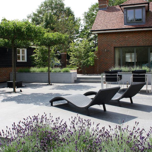 Contemporary Garden in Redbourn - patio area with deckchairs